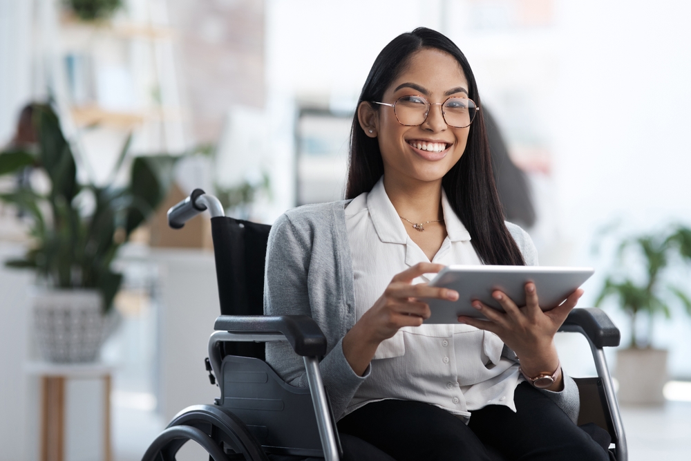 Happy,,Portrait,And,Woman,With,A,Disability,And,A,Tablet
