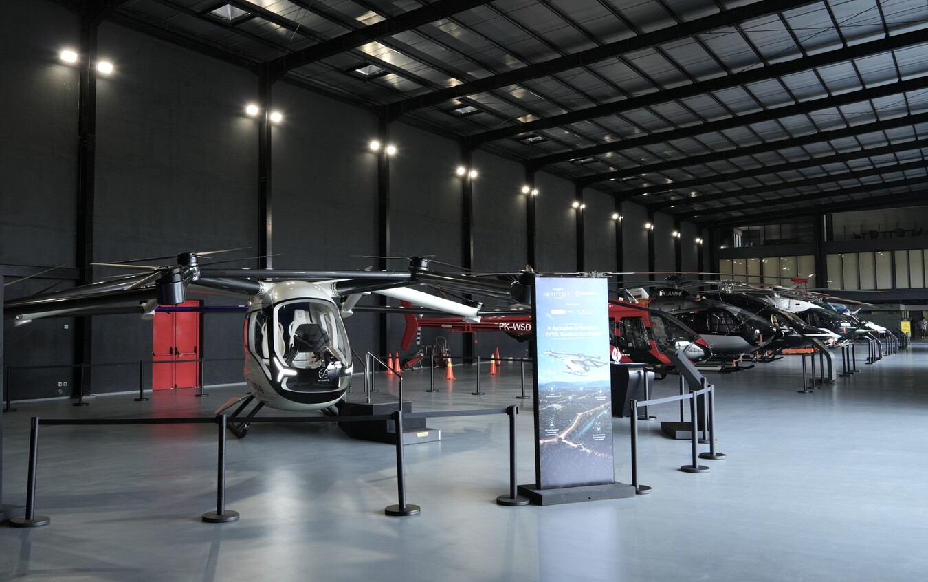 Mockup alongside variety of helicopters